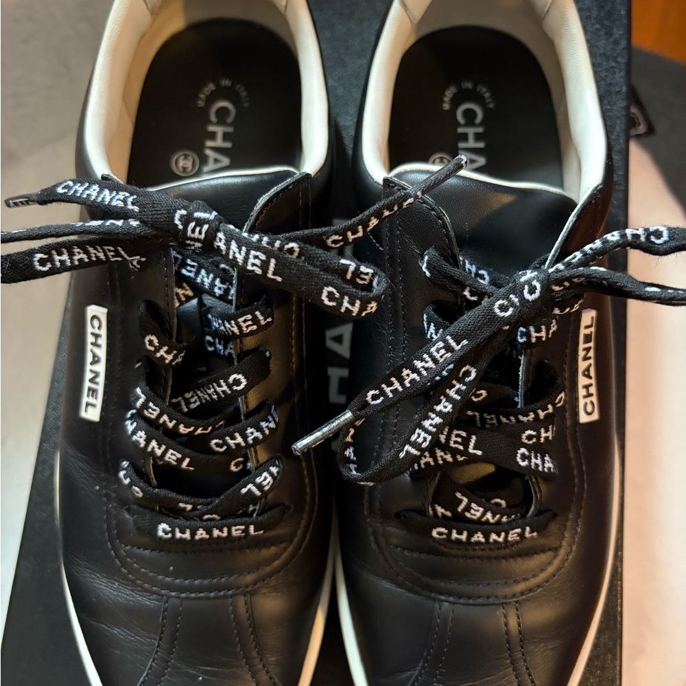CHANEL Black and White Logo Lace-Up Sneakers